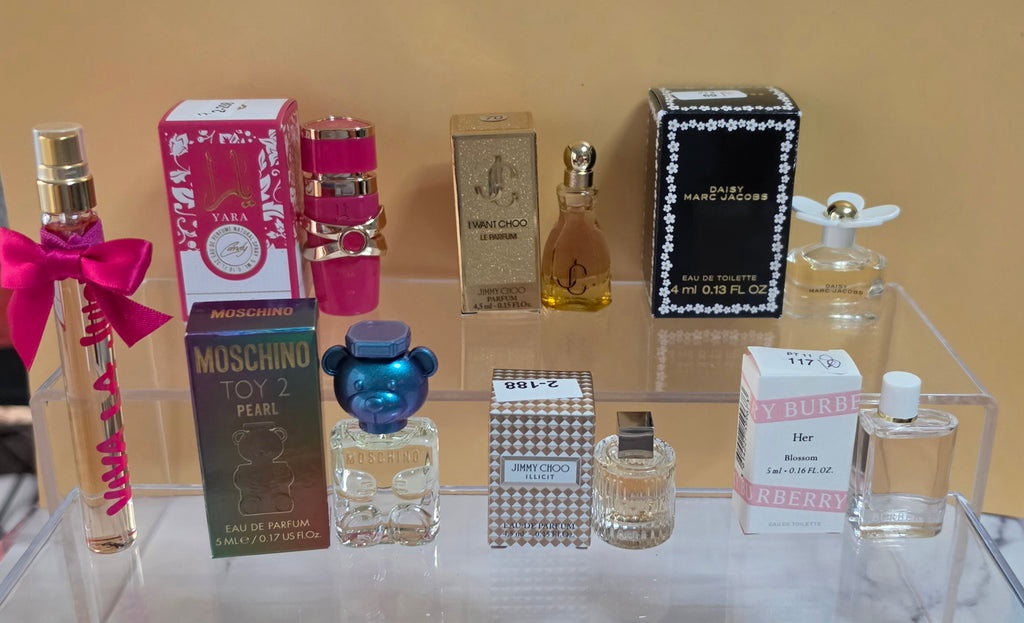 7- MINI PERFUMES DIFFERENT SIZES ( Please read description) what you see is what you will received.