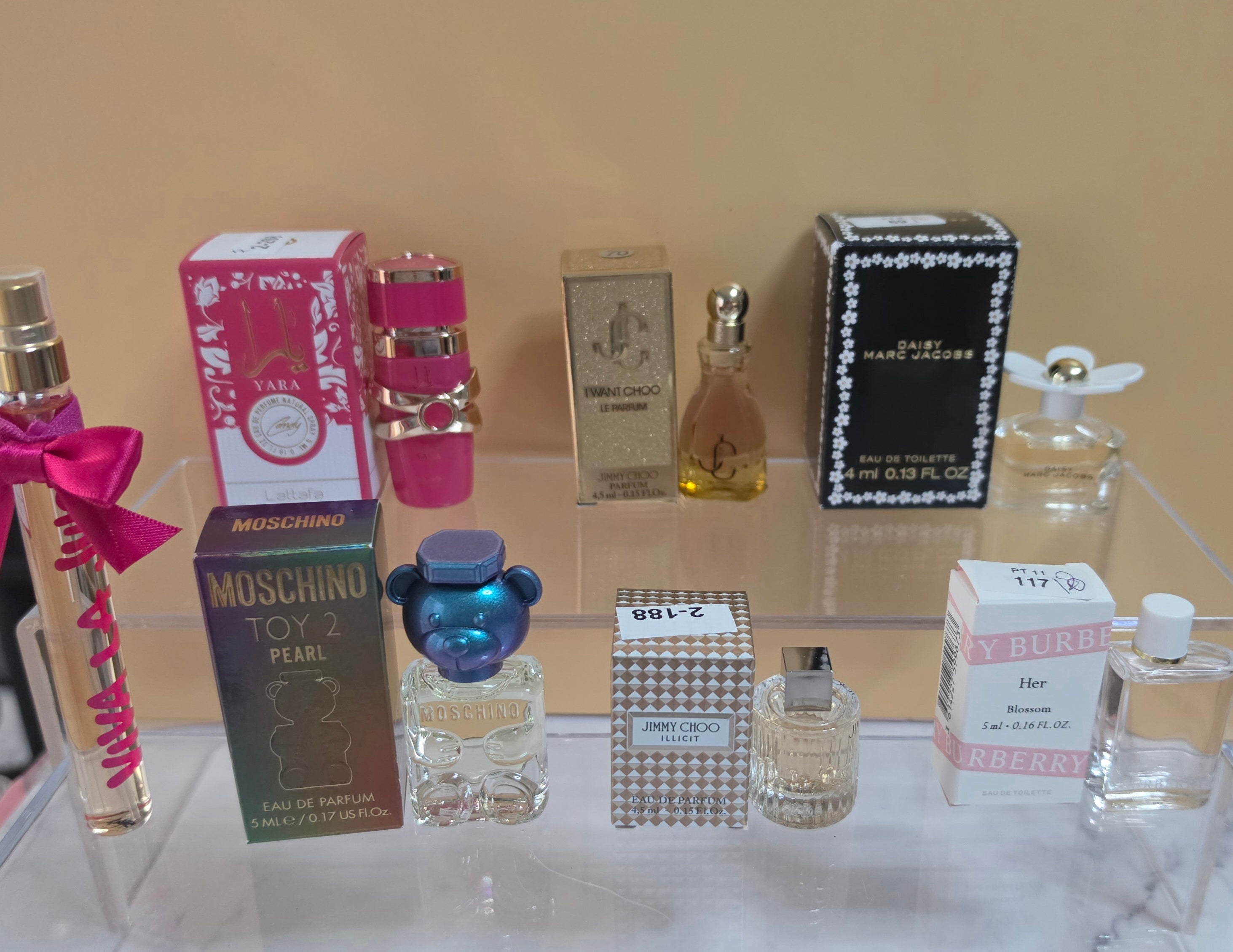7- MINI PERFUMES DIFFERENT SIZES ( Please read description) what you see is what you will received.