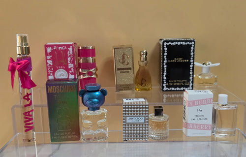 7- MINI PERFUMES DIFFERENT SIZES ( Please read description) what you see is what you will received.