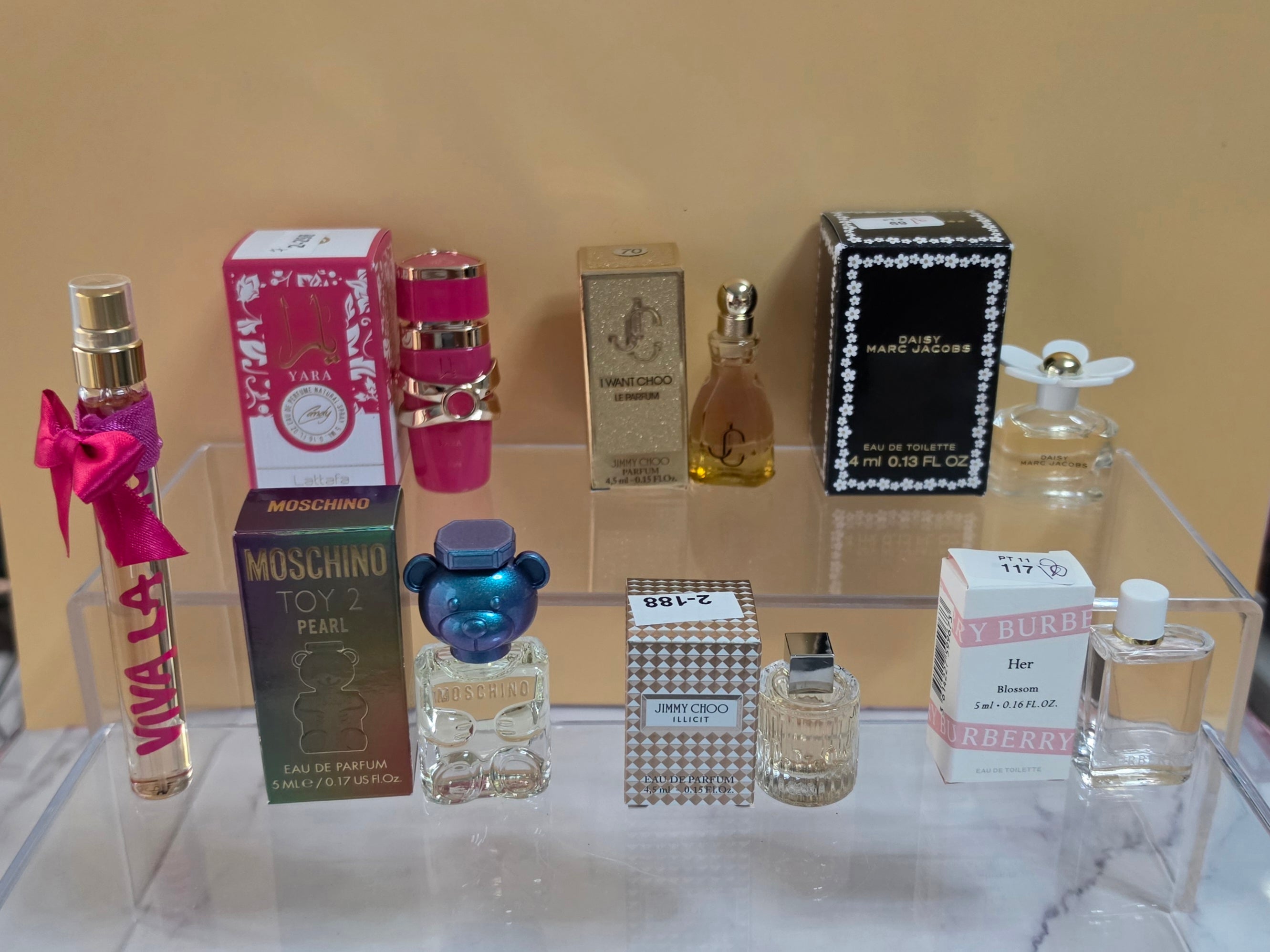 7- MINI PERFUMES DIFFERENT SIZES ( Please read description) what you see is what you will received.