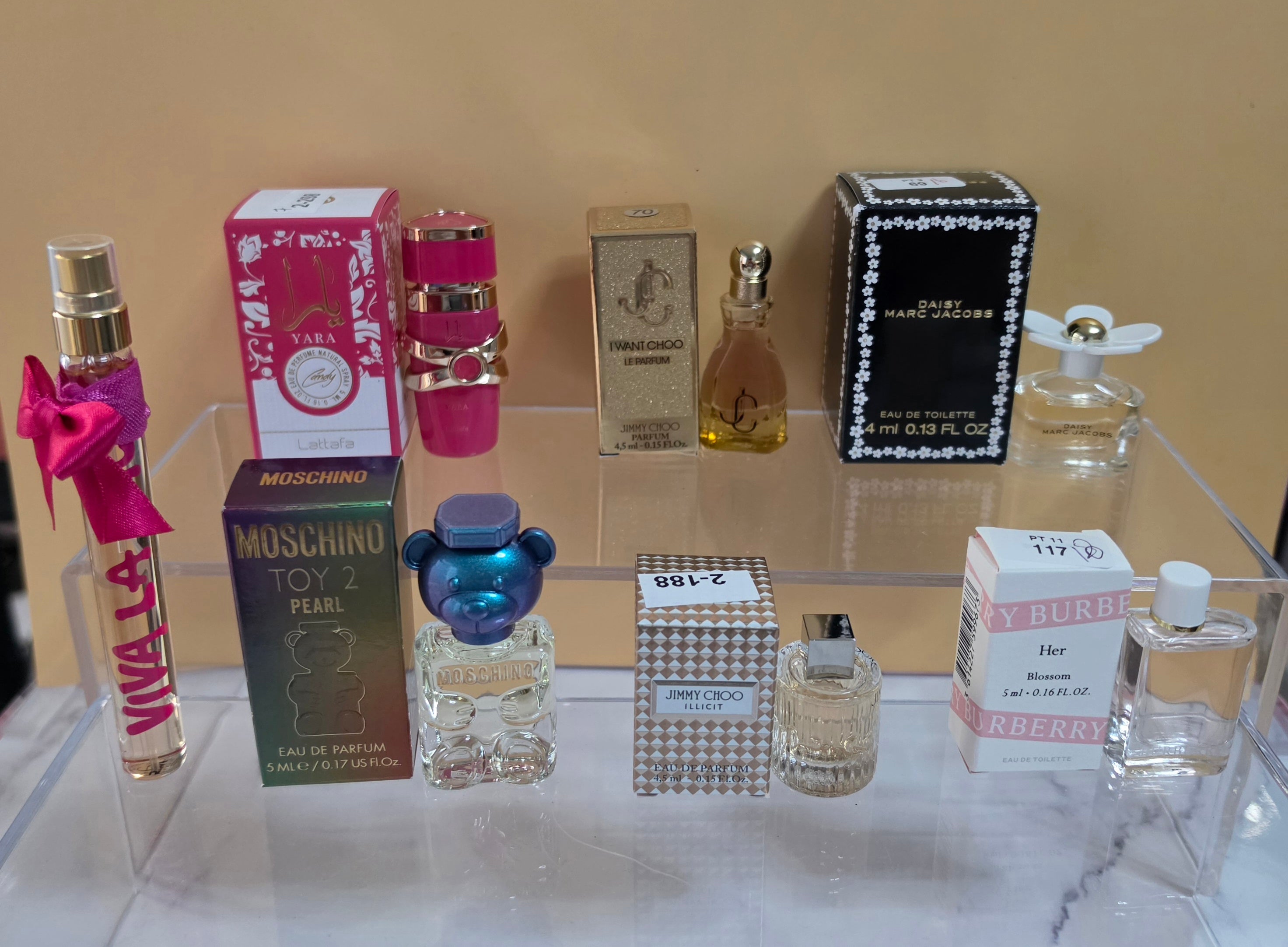 7- MINI PERFUMES DIFFERENT SIZES ( Please read description) what you see is what you will received.